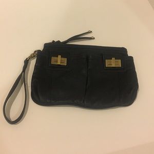 Navy Sabina New York wristlet with gold accents